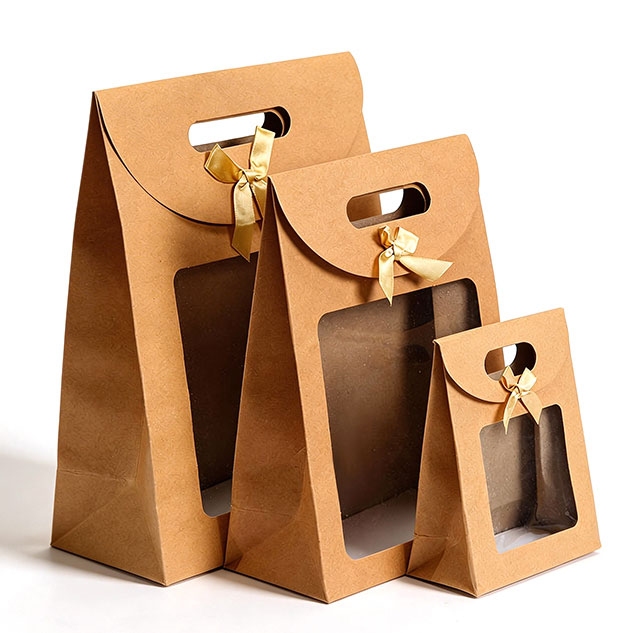 Sizes of kraft gift bags with transparent window and golden bow